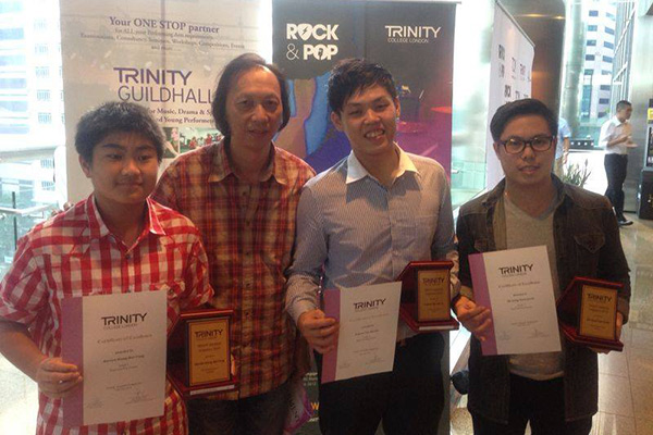 Singapore students passing Trinity Rock School exam!
